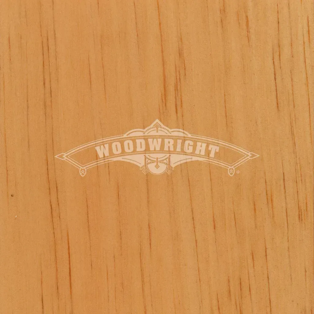 Light-brown wooden surface with a decorative white 