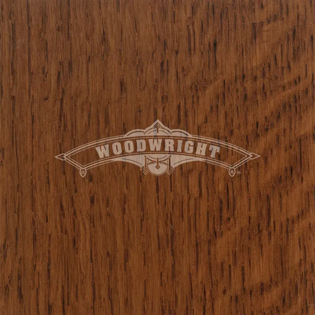 Woodgrain with “Woodwright” logo etched in. Brown wood with vertical grain.
