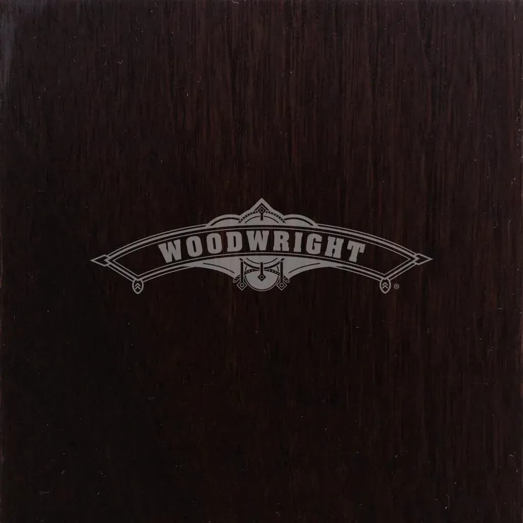 Dark wood grain background with the logo 