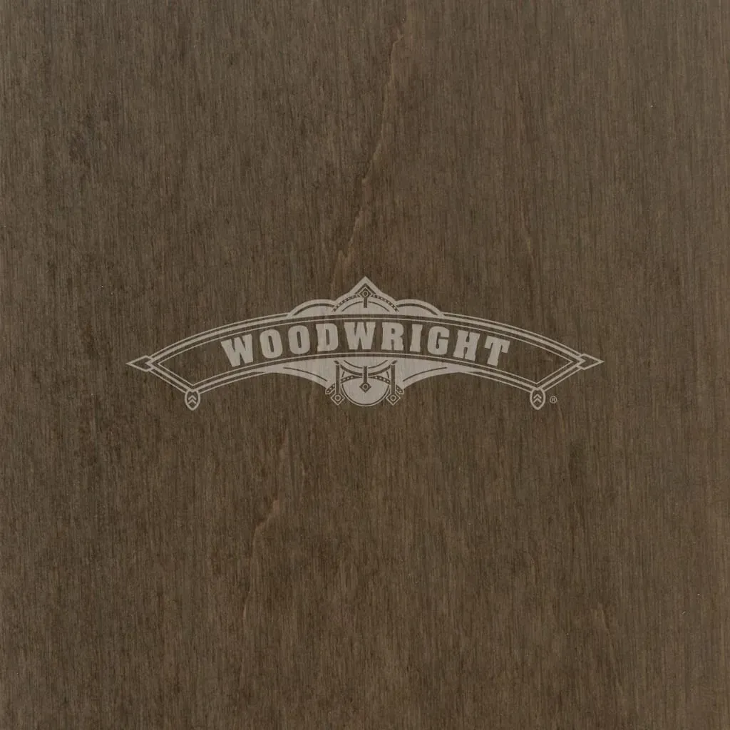 Logo for Woodwright in light gray on a brown wood grain background.