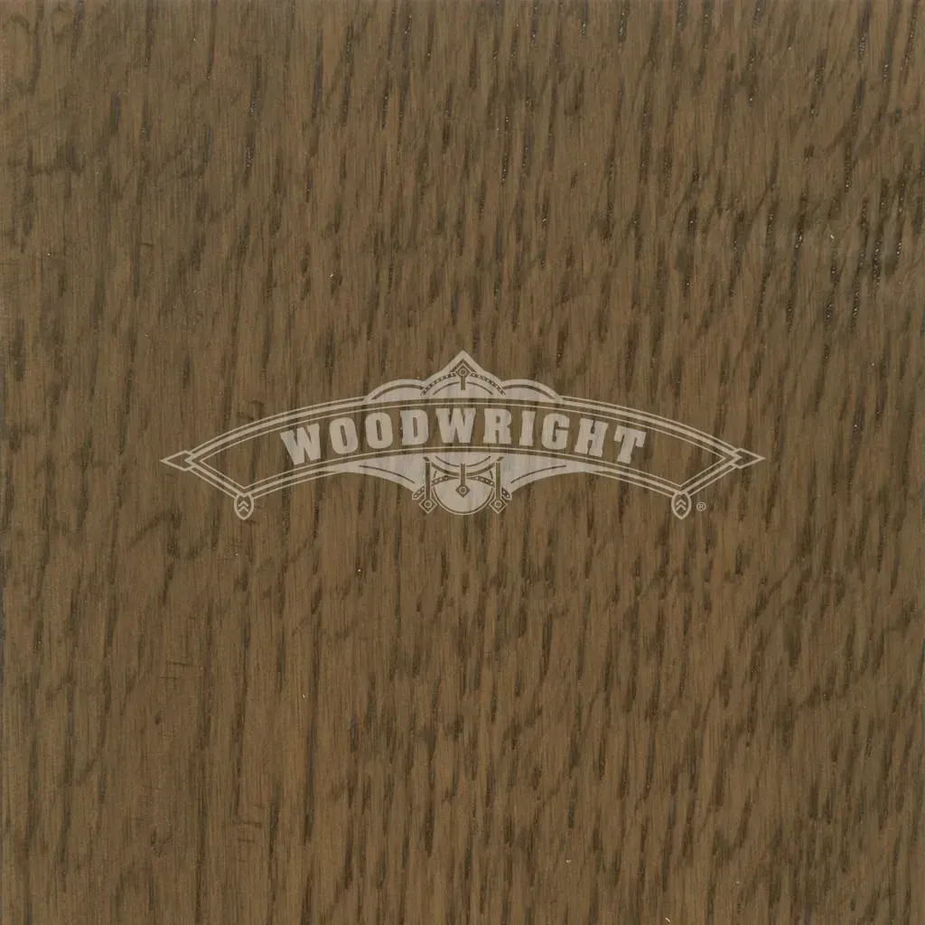 Woodwright logo on a textured brown wood background. The logo is a light color.