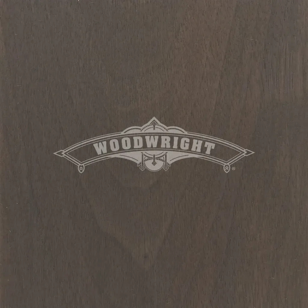 Woodwright logo on brown wood grain background.
