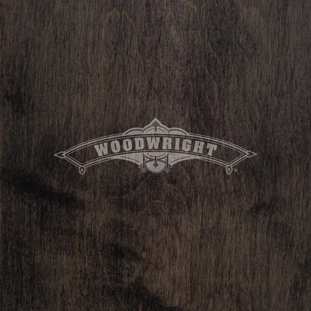 Woodwright logo on dark wood background.