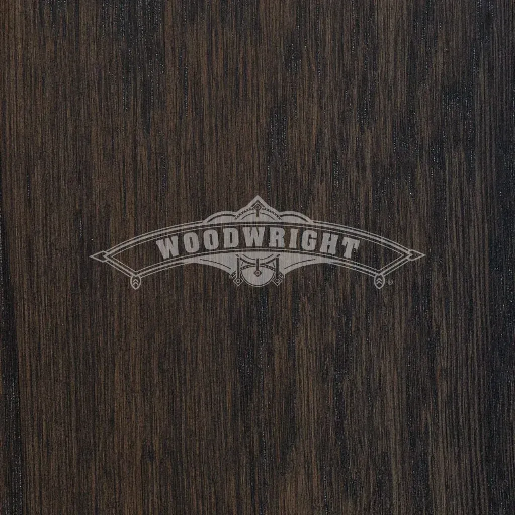 Woodwright logo etched in light gray on dark wood grain.