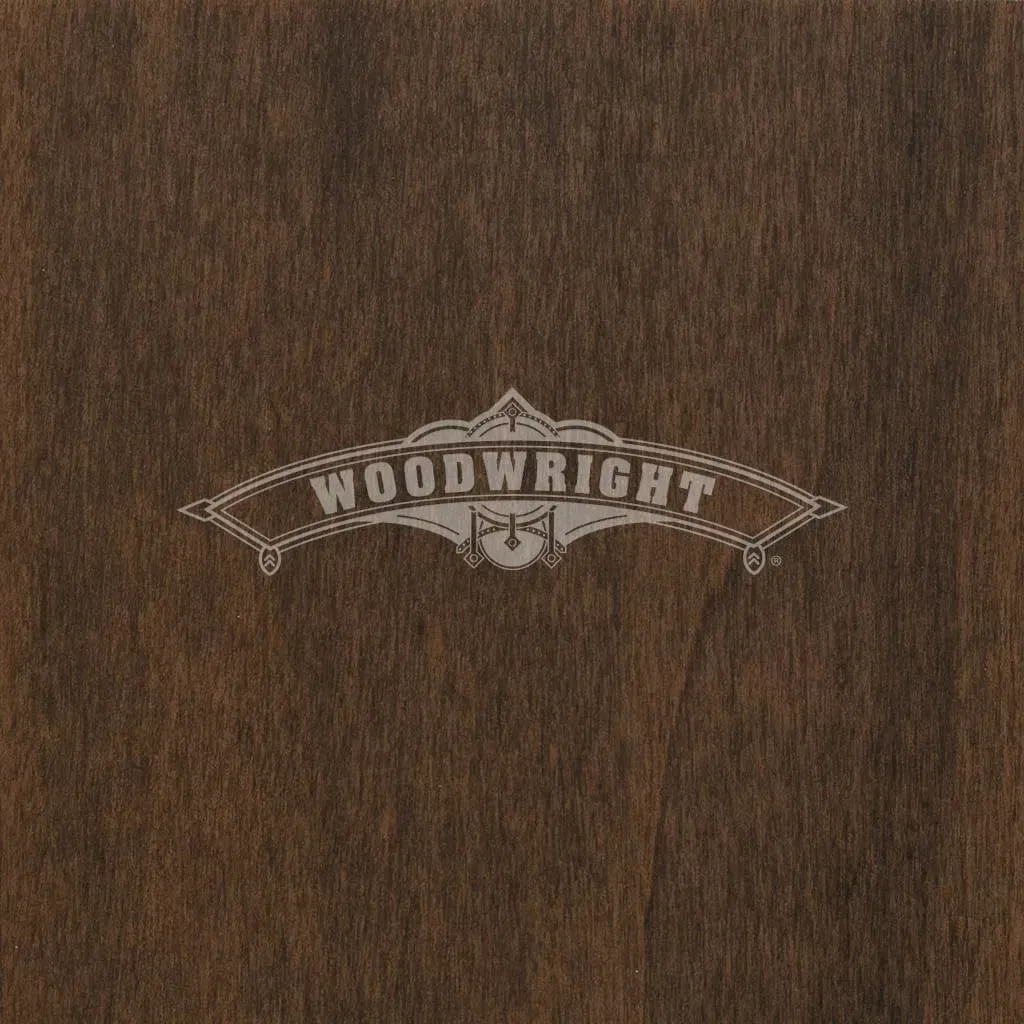 Logo for Woodwright on a dark wood grain background.