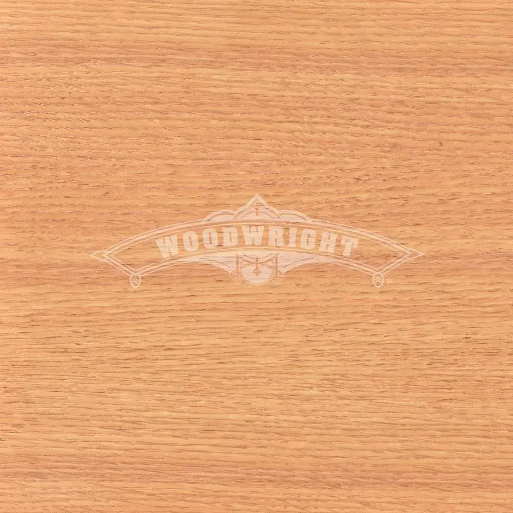 Close-up of a light brown wood grain surface with the 