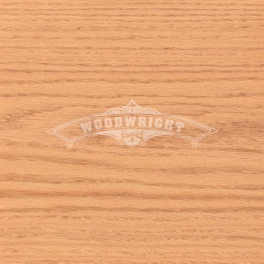 Close-up of a wood grain pattern, featuring reddish-brown tones and the 