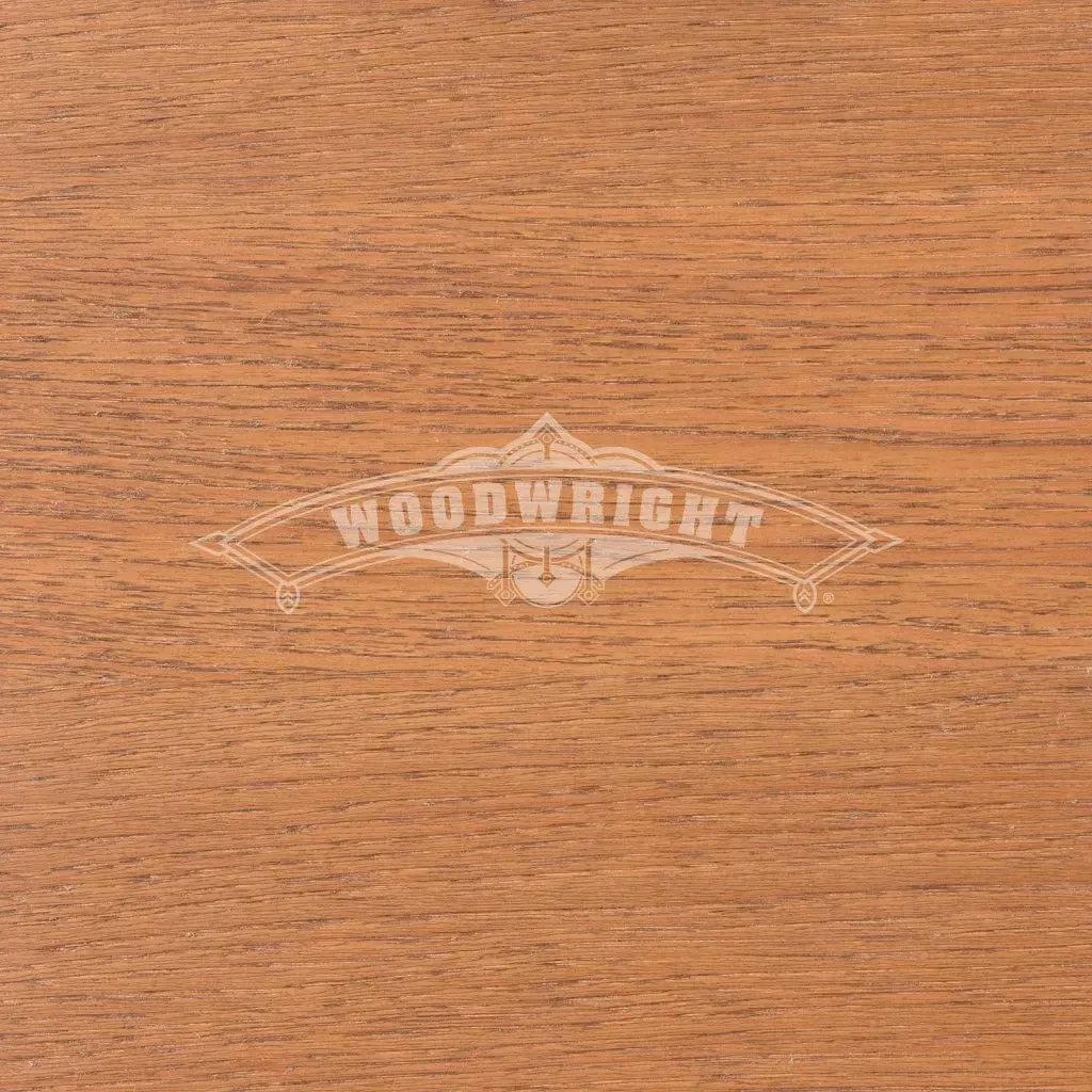 Close-up of reddish-brown wood grain with 