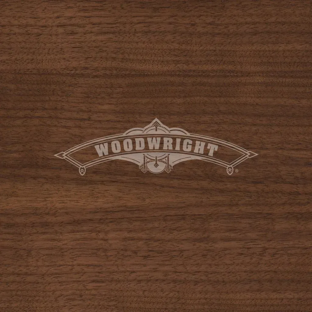 Woodwright logo on brown wood grain background.