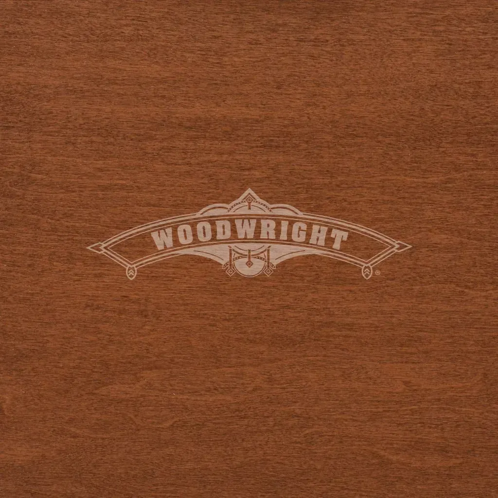 Woodwright logo on brown wood grain background.