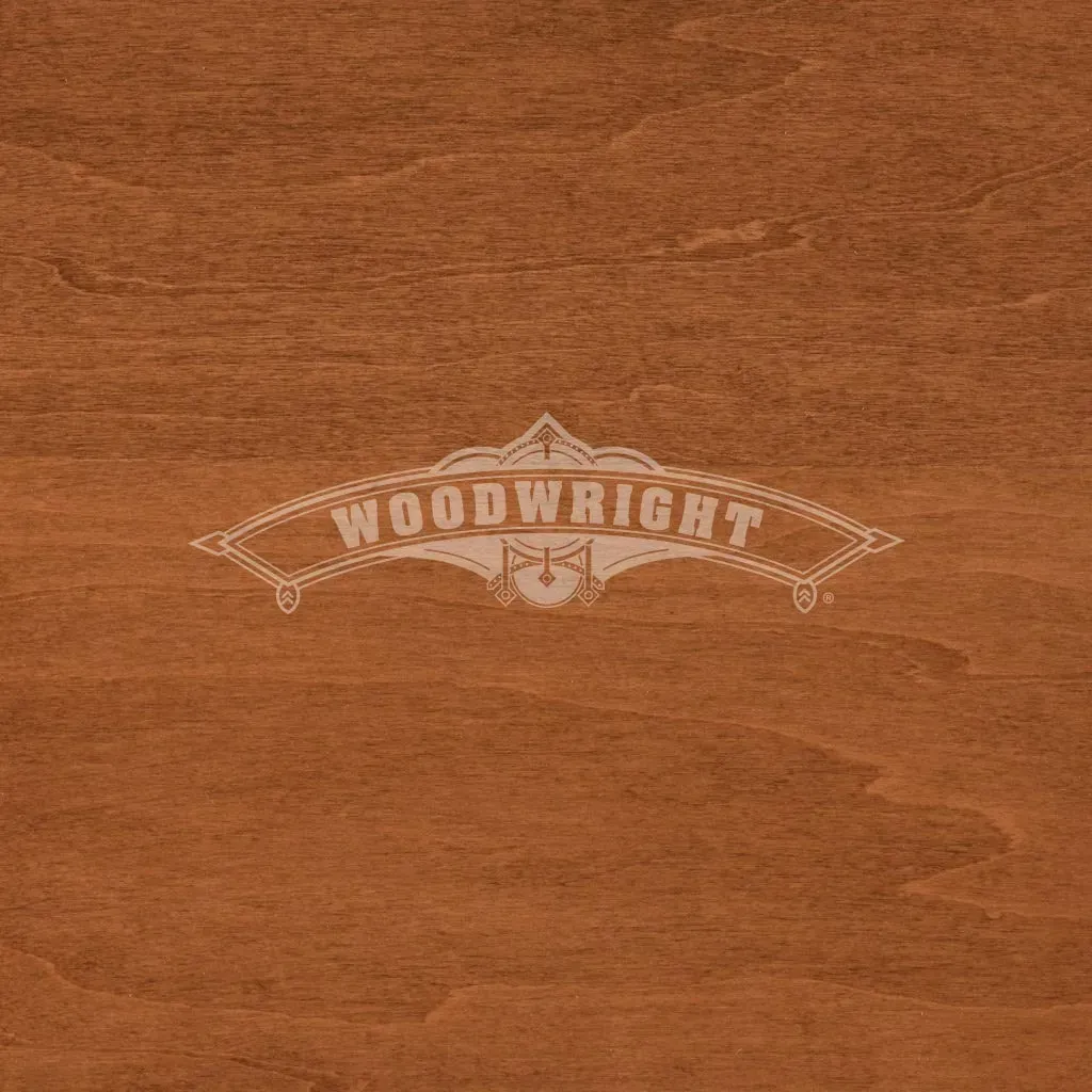 Woodwright logo on brown wood grain background.