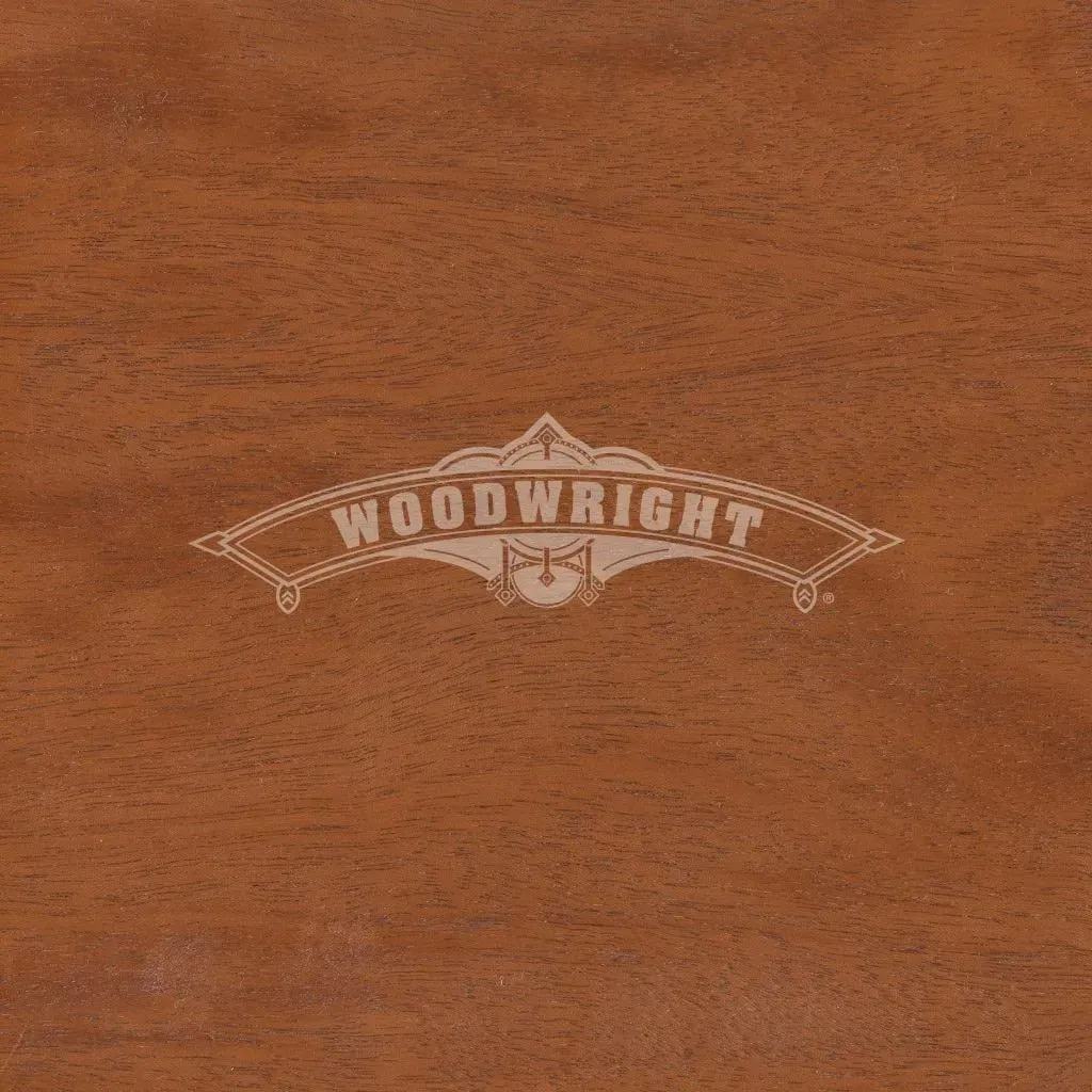 Woodwright logo on a brown wood background.