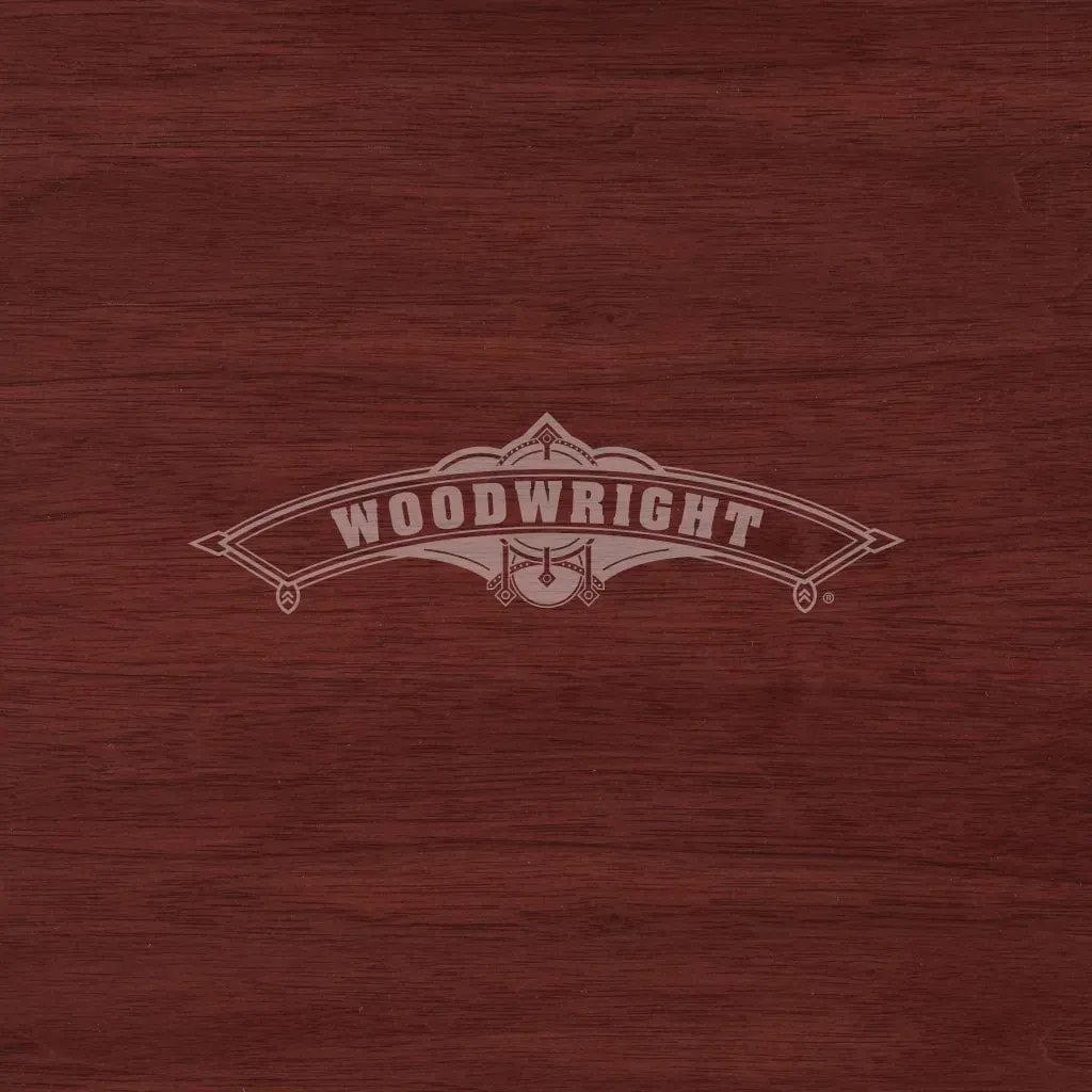 Woodwright logo on a dark red woodgrain surface.