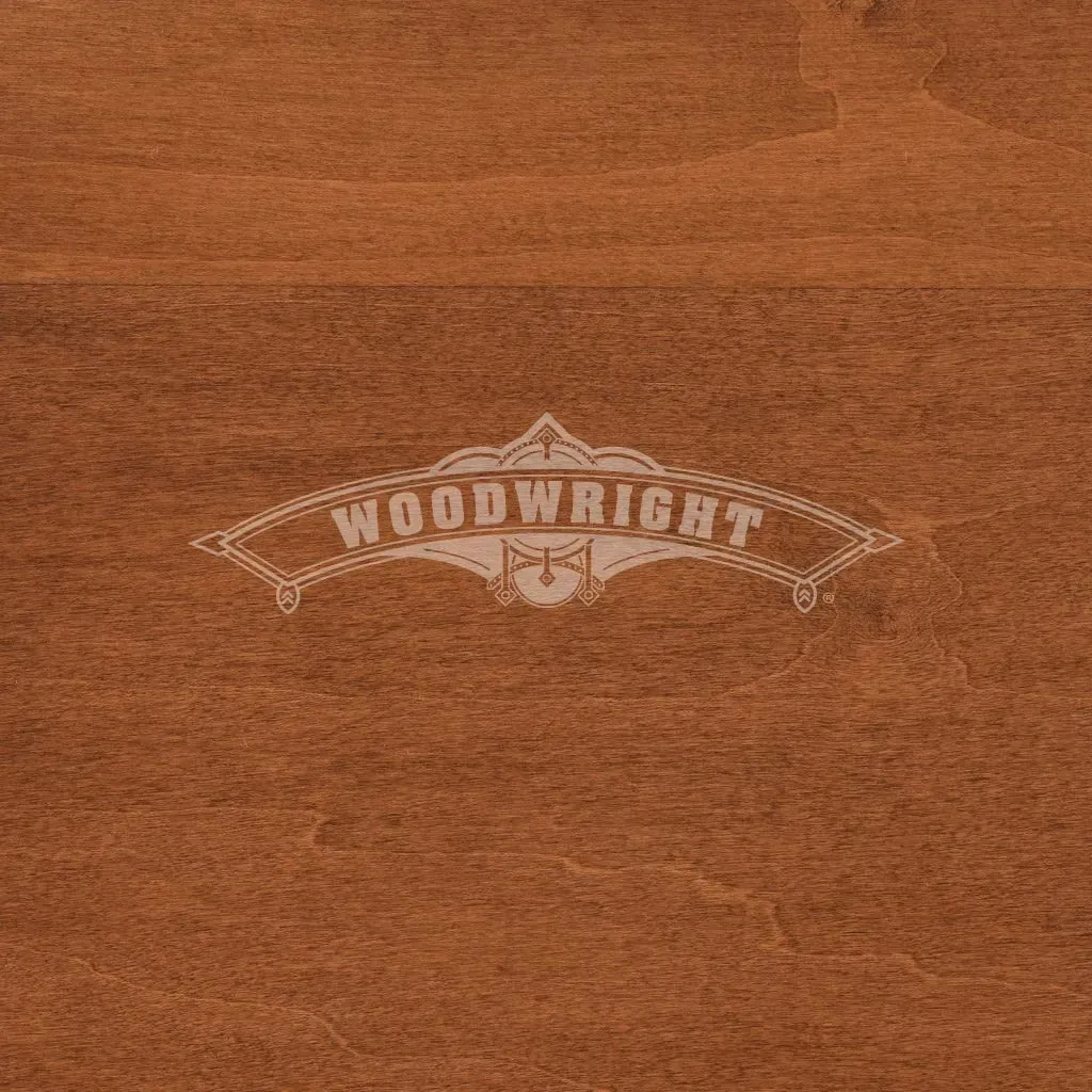 Woodwright logo on brown wood grain background.