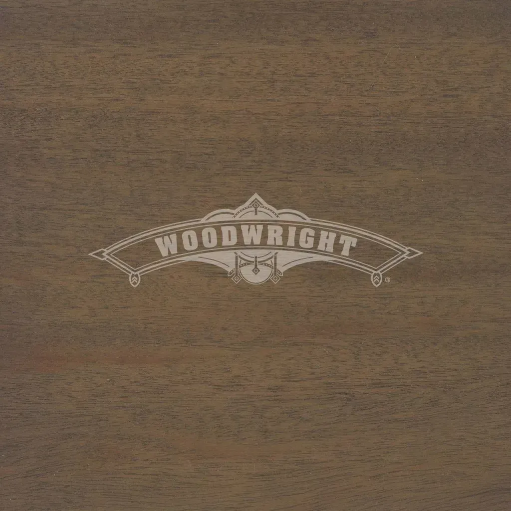 Woodwright logo on brown wood grain background.