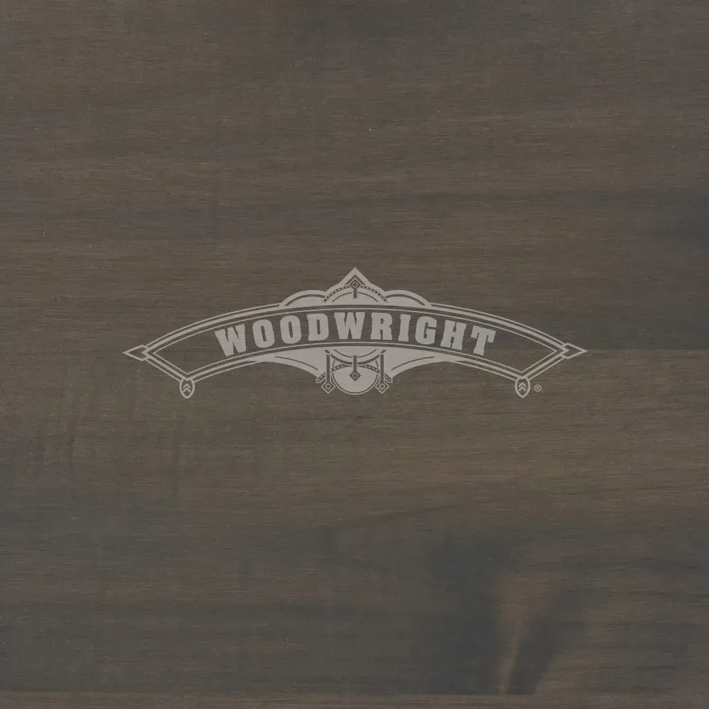 Woodwright logo on a gray-brown wood grain background.