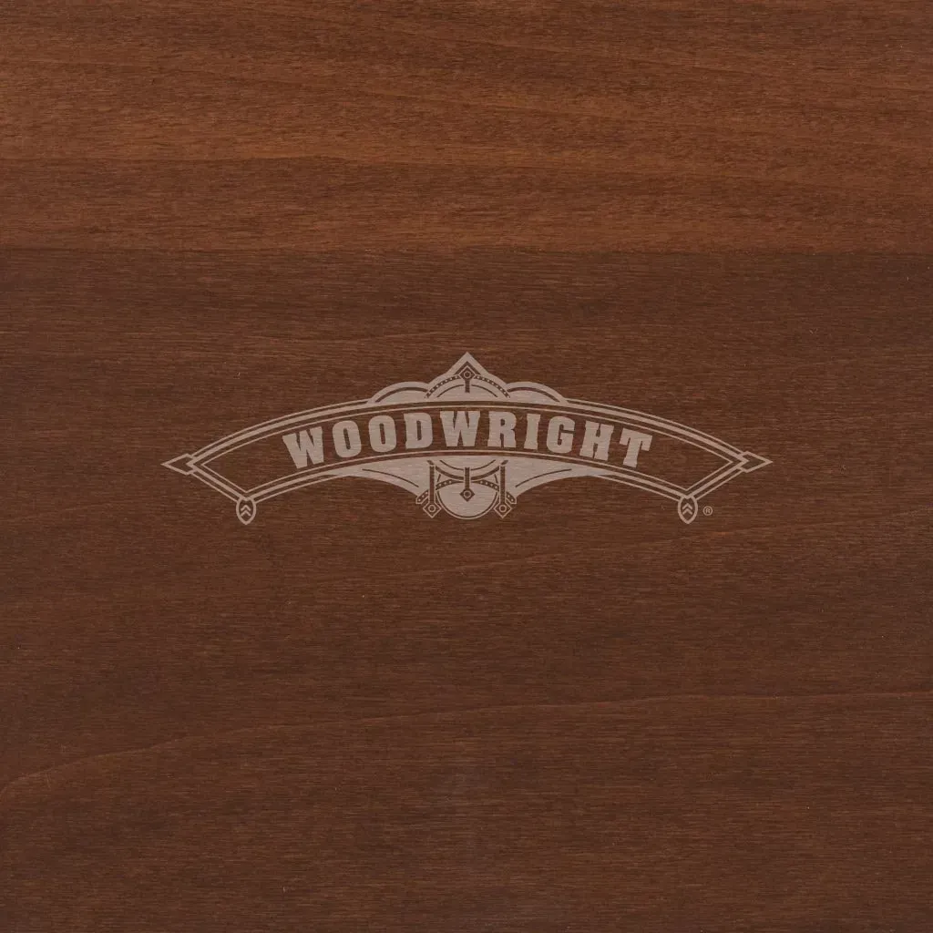 Woodwright logo on a dark brown wood grain background.