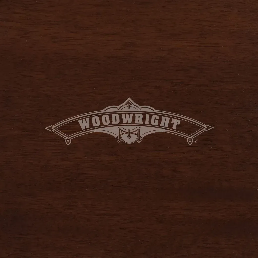 Logo on a dark brown wooden surface: 