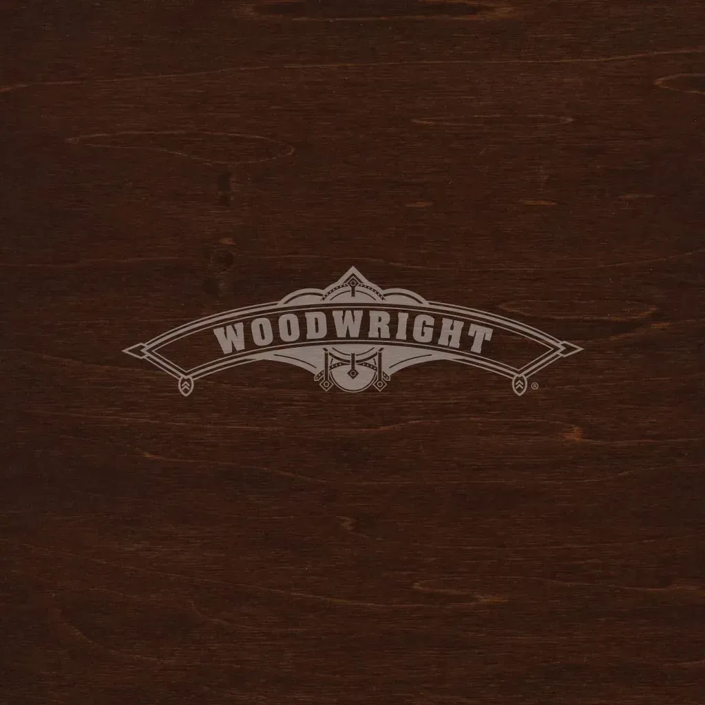 Dark brown wooden surface with the word 