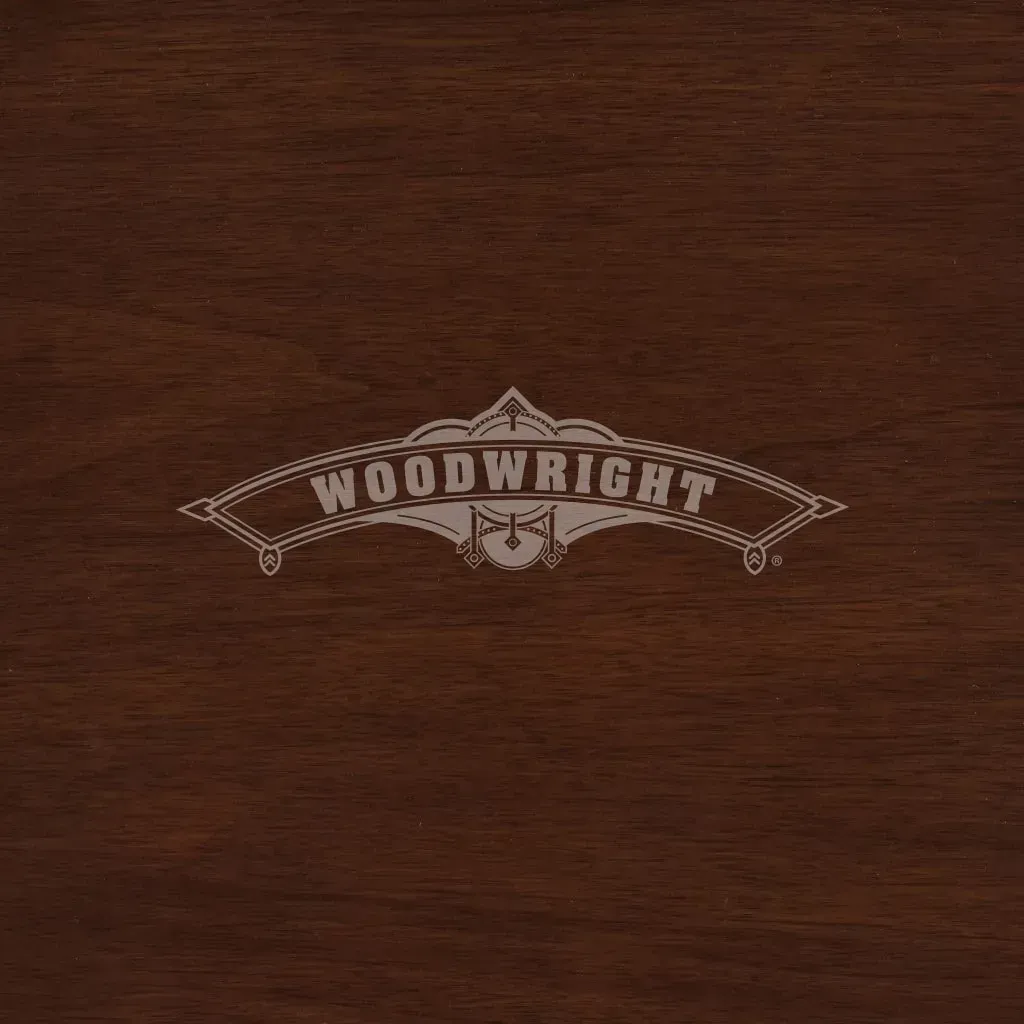 Woodwright logo on a dark wood surface.