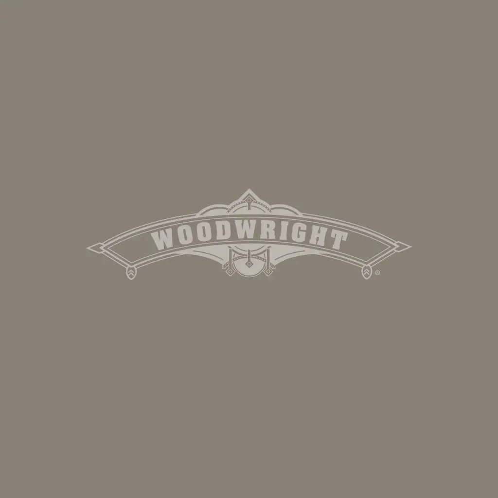 Woodwright logo, gray on a tan background.