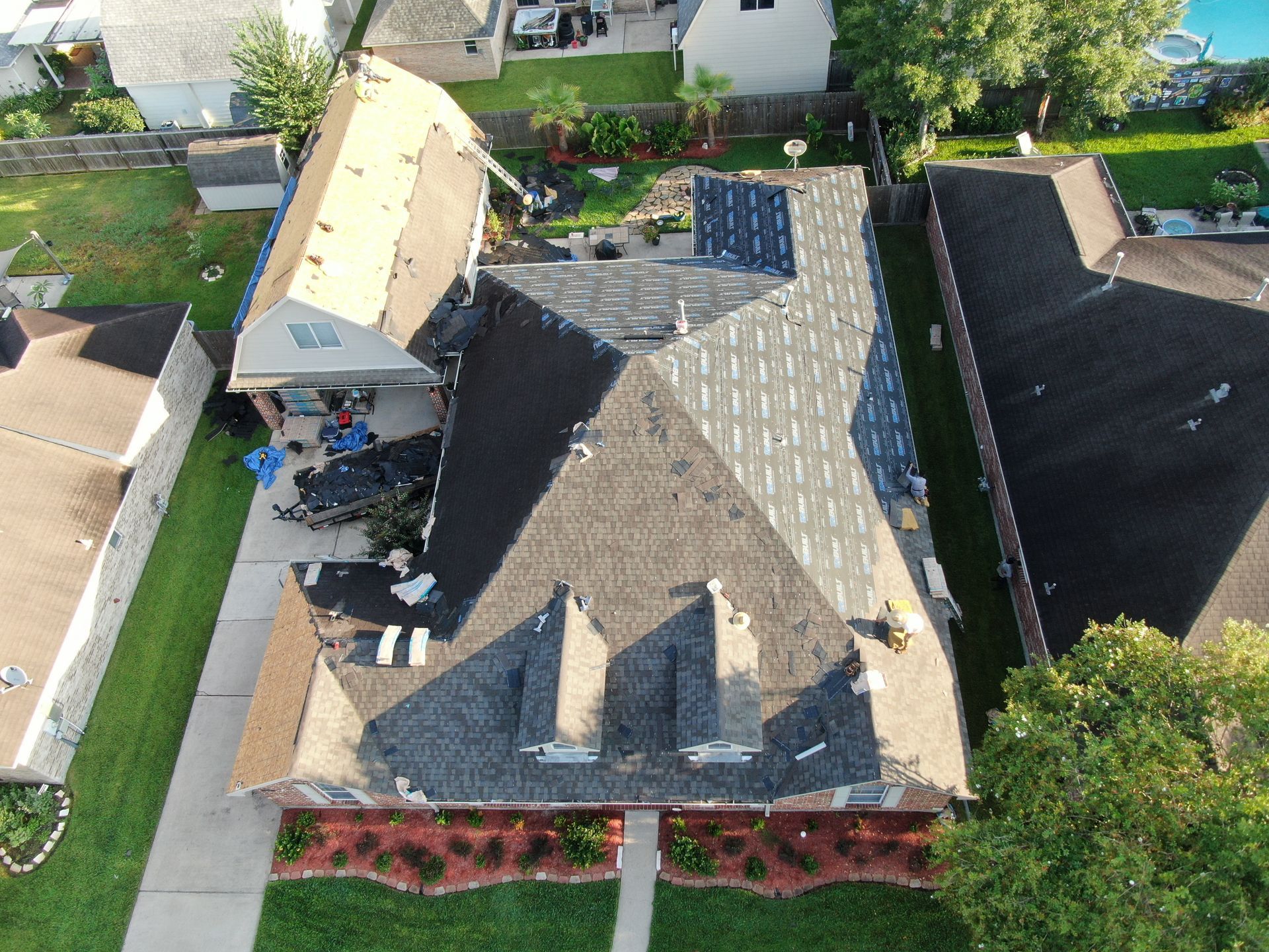 Men Repairing A Roof