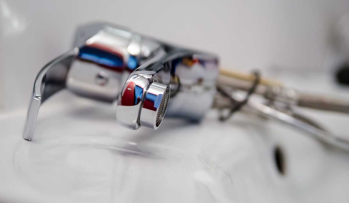 licensed plumber installing water softener Phoenix