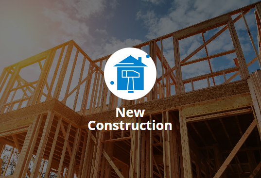 Framed wooden structure of a house under construction with a