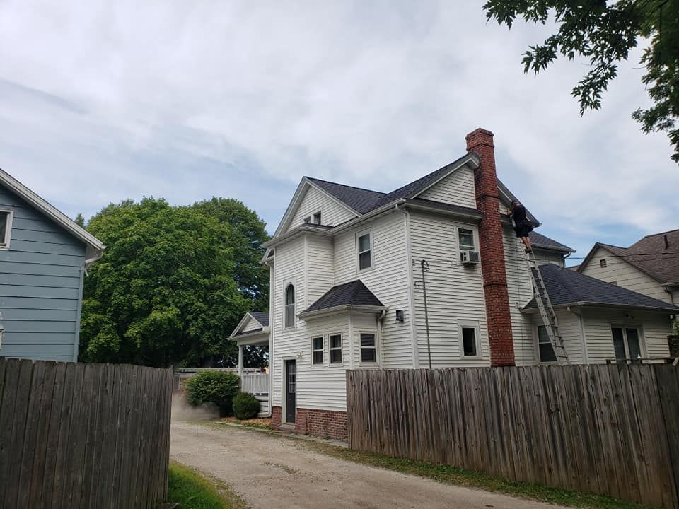 New Installed White Siding — Ogden, IA — Pritchard Roofing & Construction