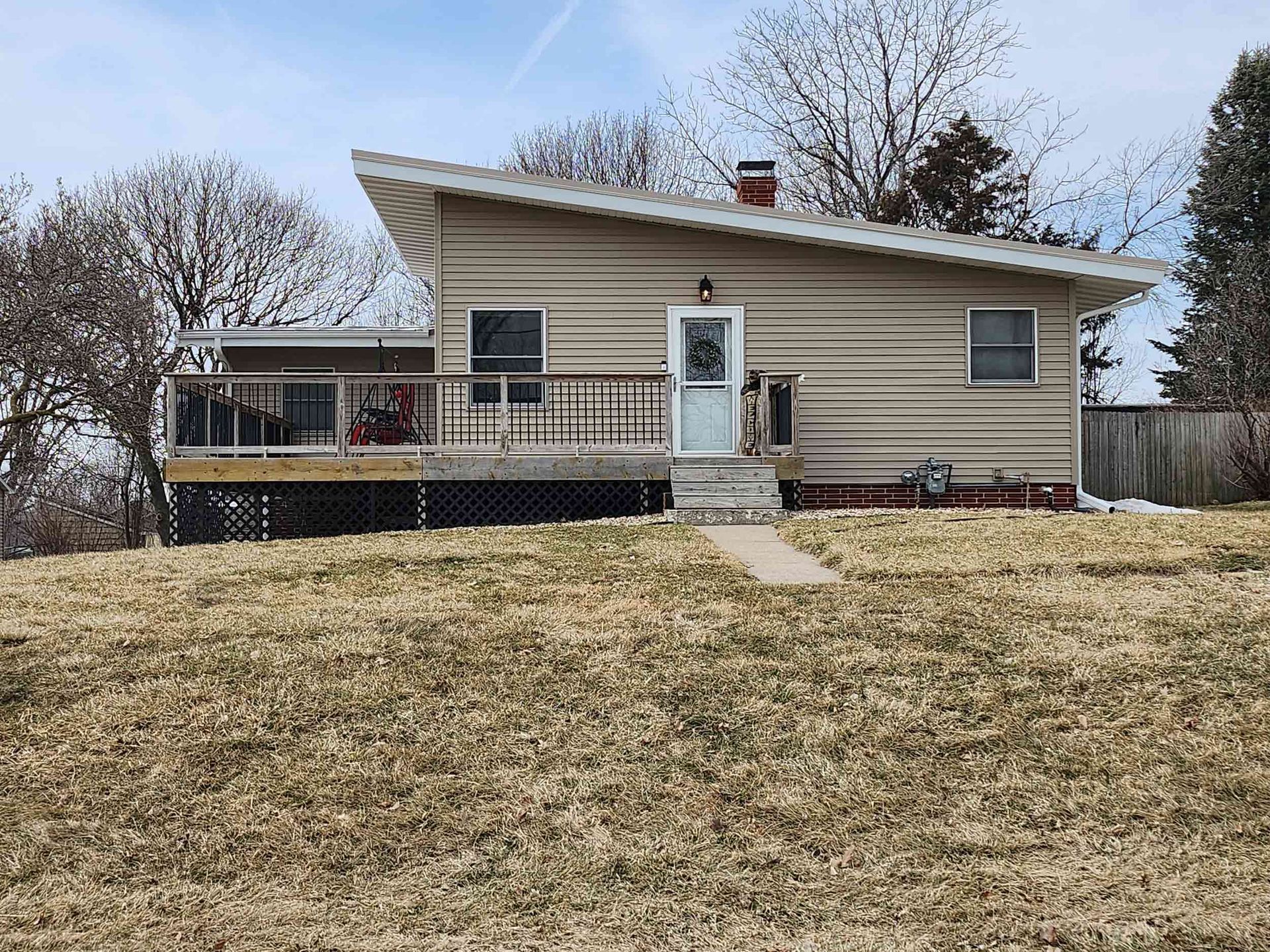 Cream Color Wood Sidings — Ogden, IA — Pritchard Roofing & Construction