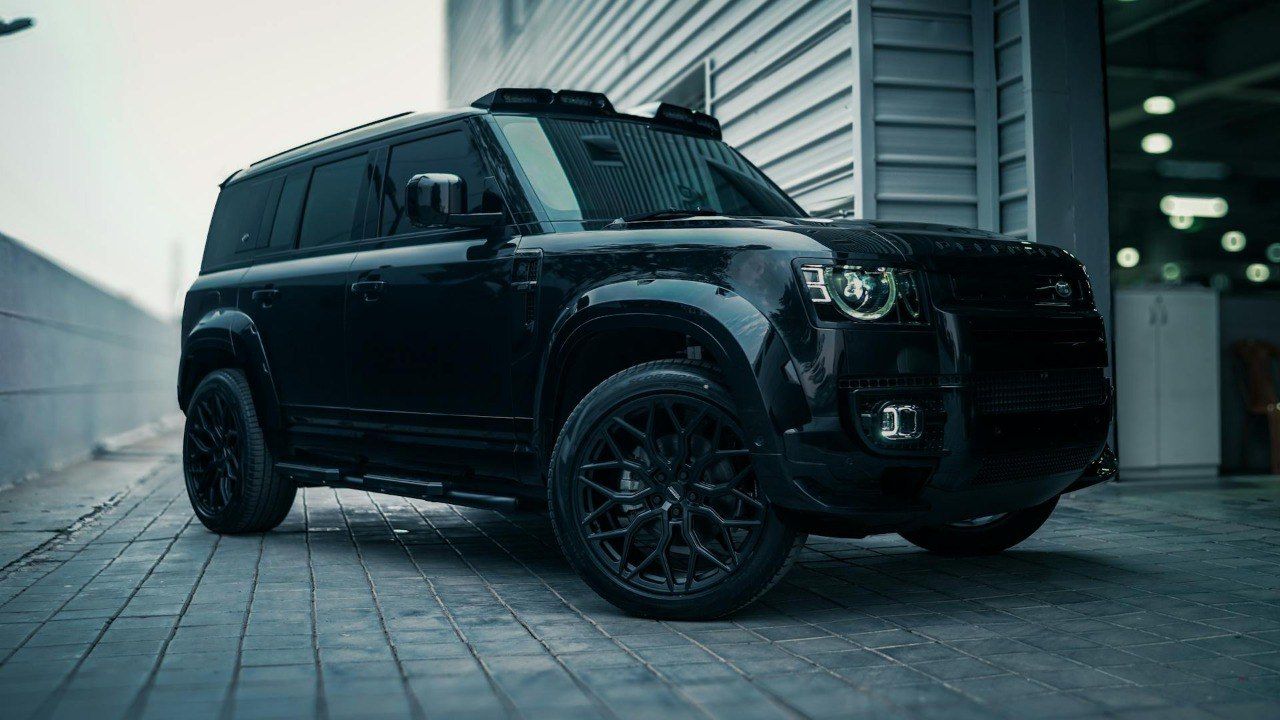 Dark tinted SUV in summer sun