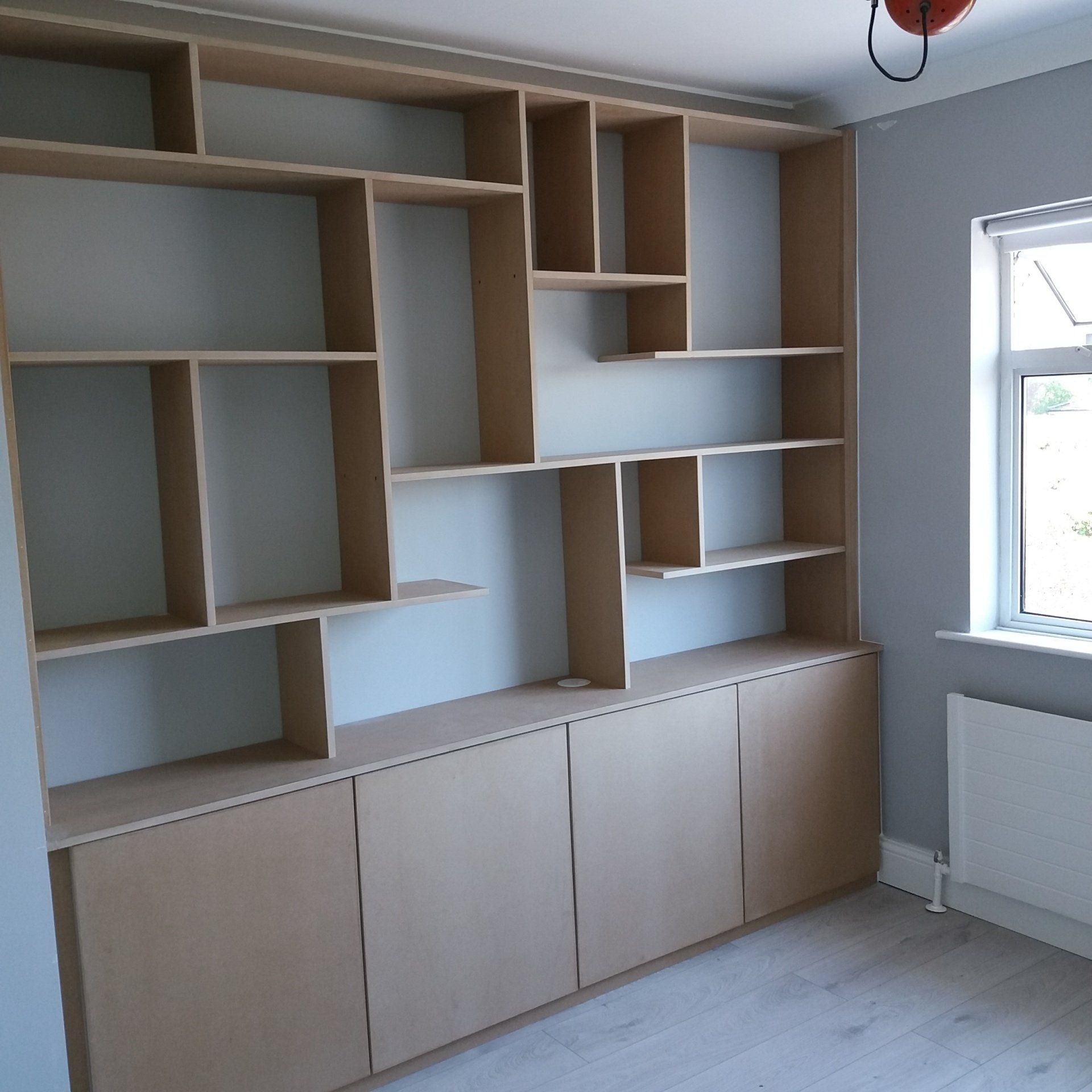 staggered shelving, funky shelving