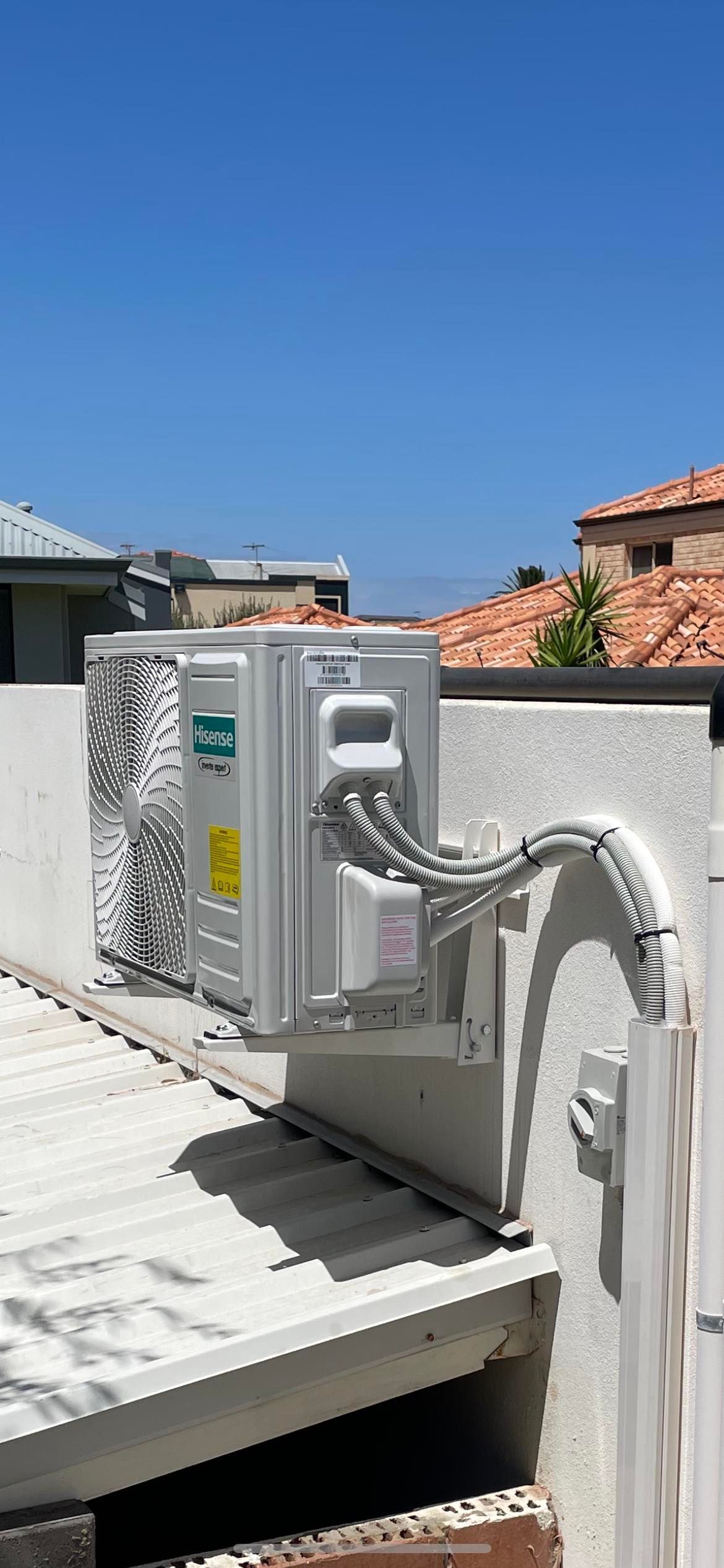 Outdoor unit of a Split System Air Conditioner Installed onto External Wall
