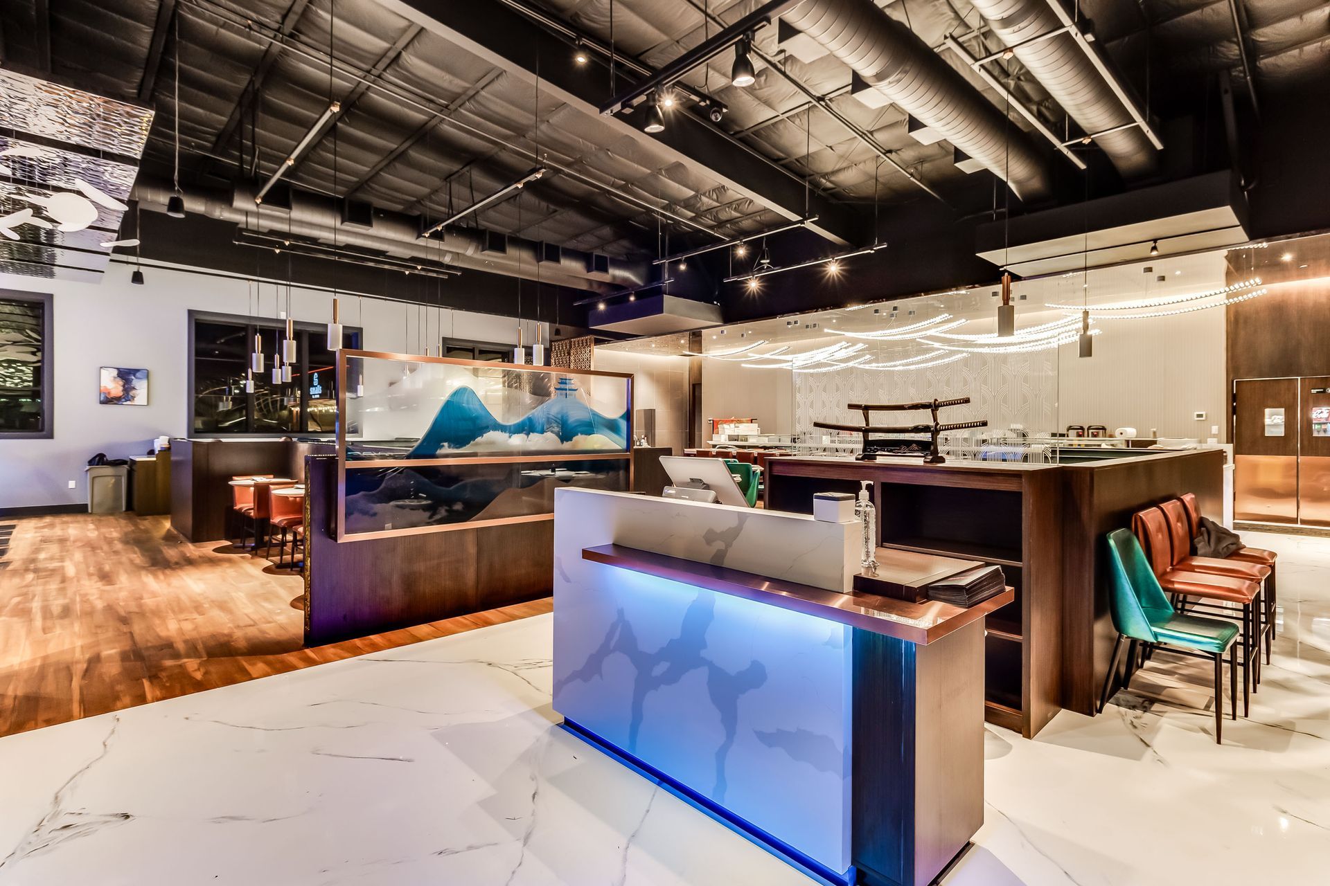 A large room with a counter in the middle of it.