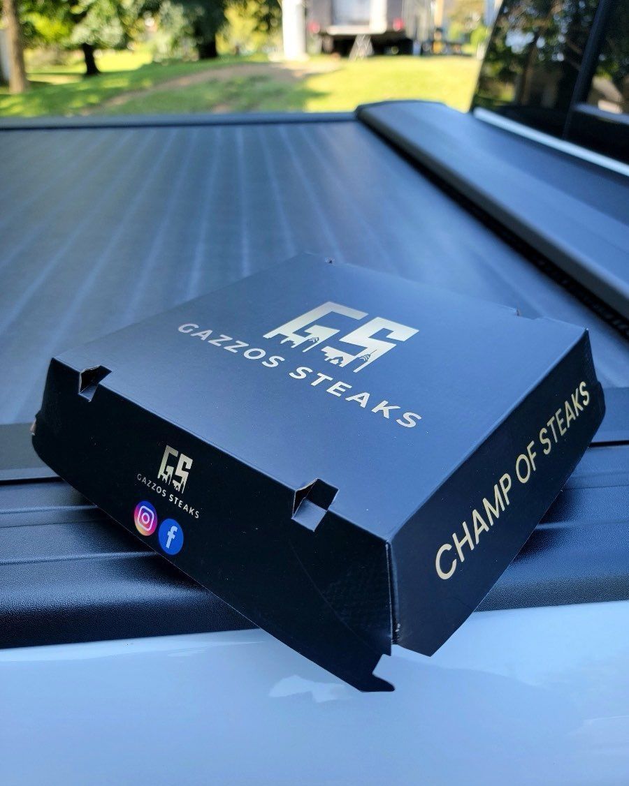 Top: Black food container with clear lid. Bottom: White takeout box with "Enviropac" logo.