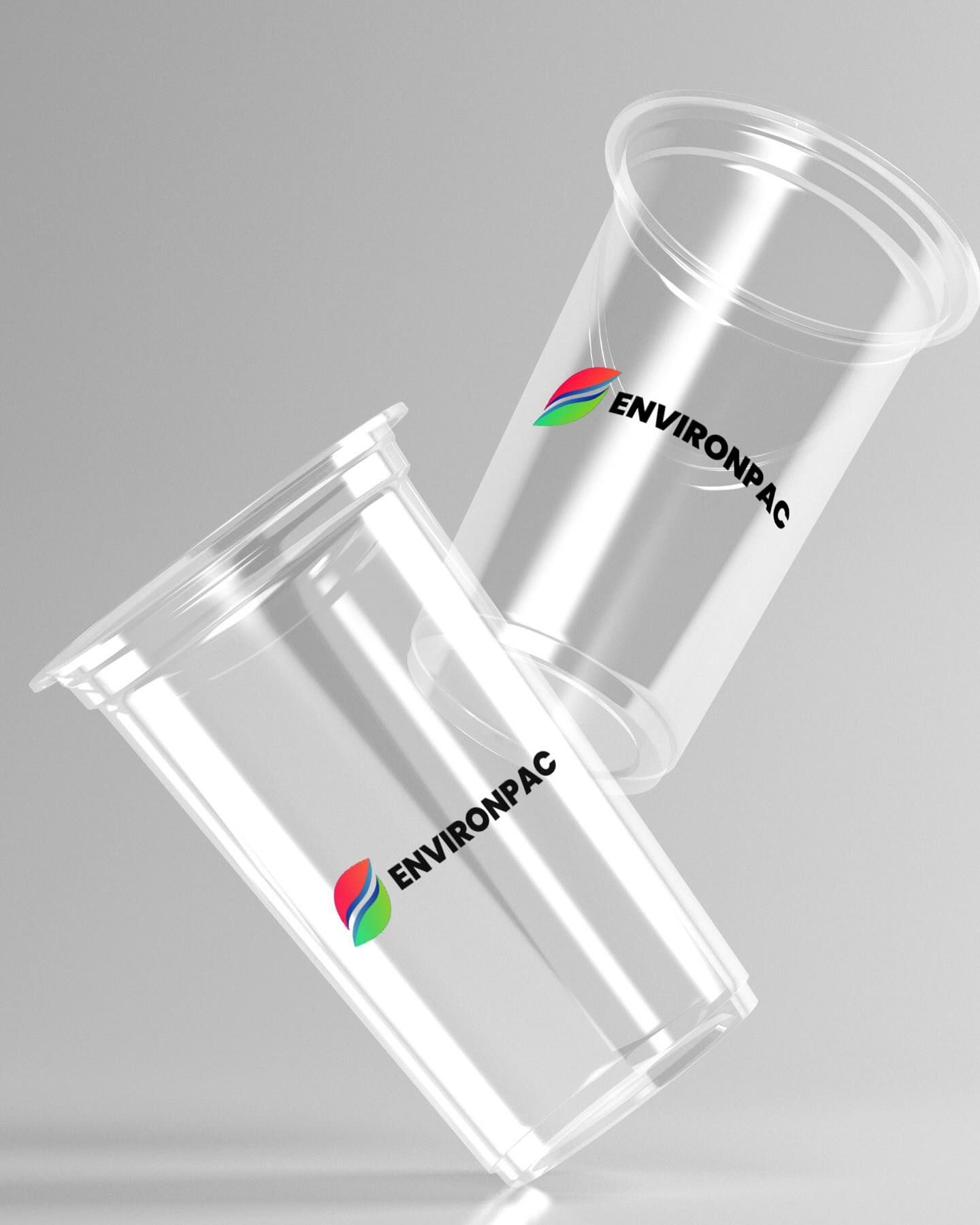 Two clear plastic cups with "ENVIRONPAC" logo, stacked on a gray background.