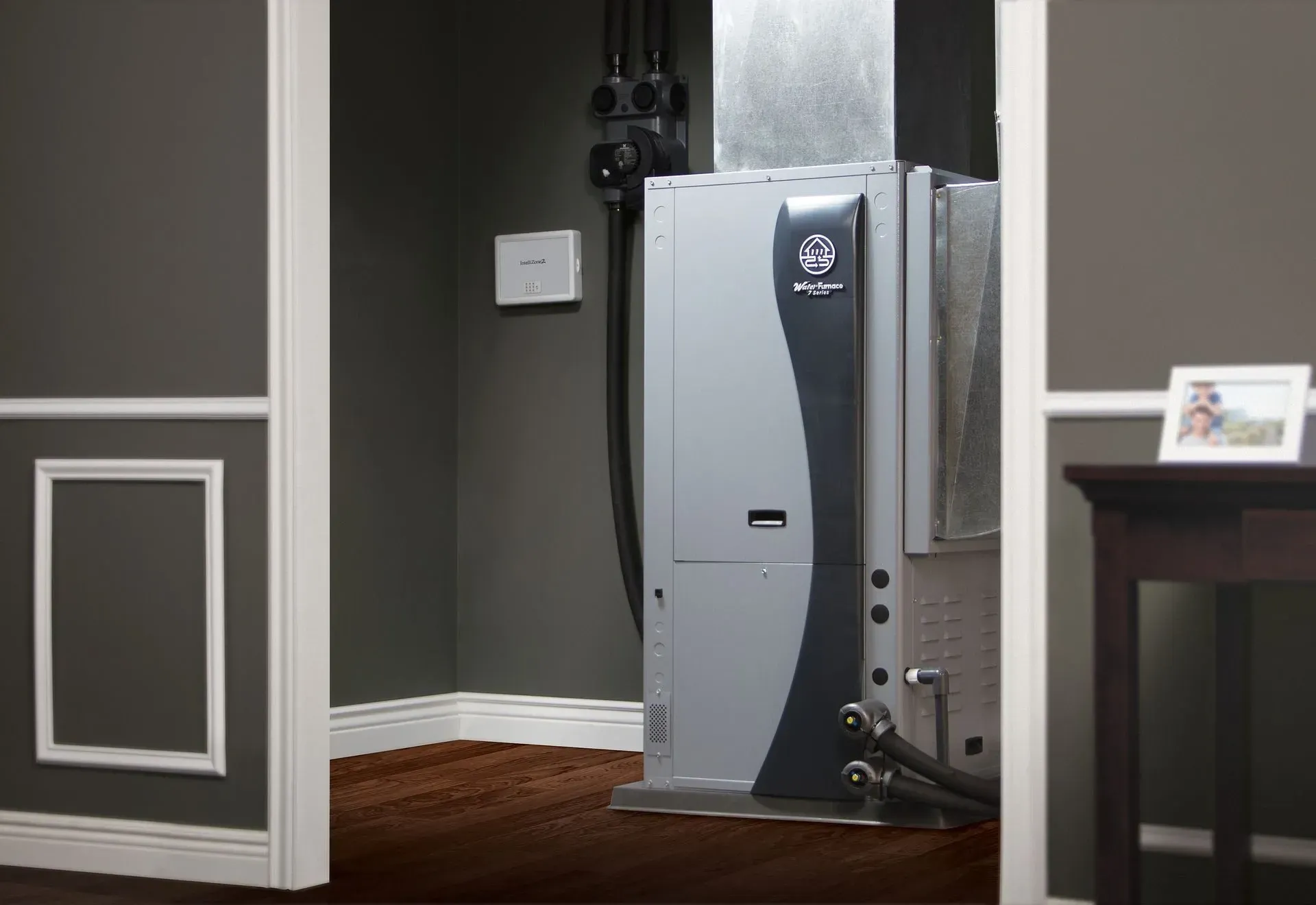 WaterFurnace geothermal heating and cooling unit inside closet