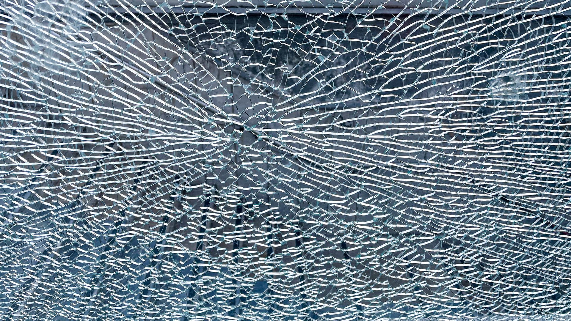 A close up of a broken glass window - Seagrove, NC - Seagrove Glass Shop