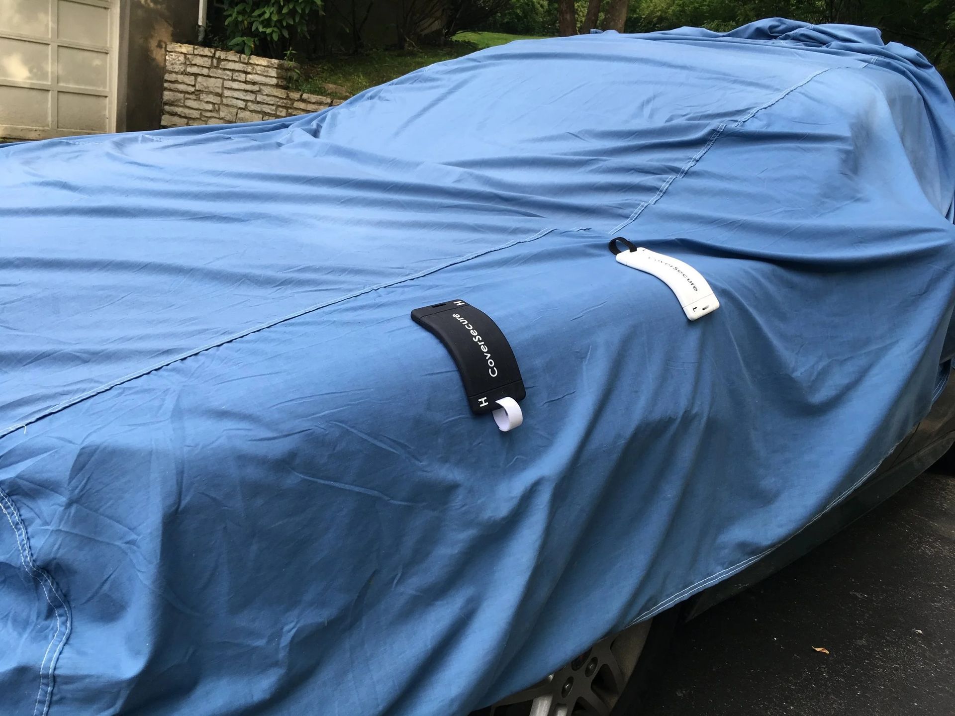 blue car cover with cover secure product in view