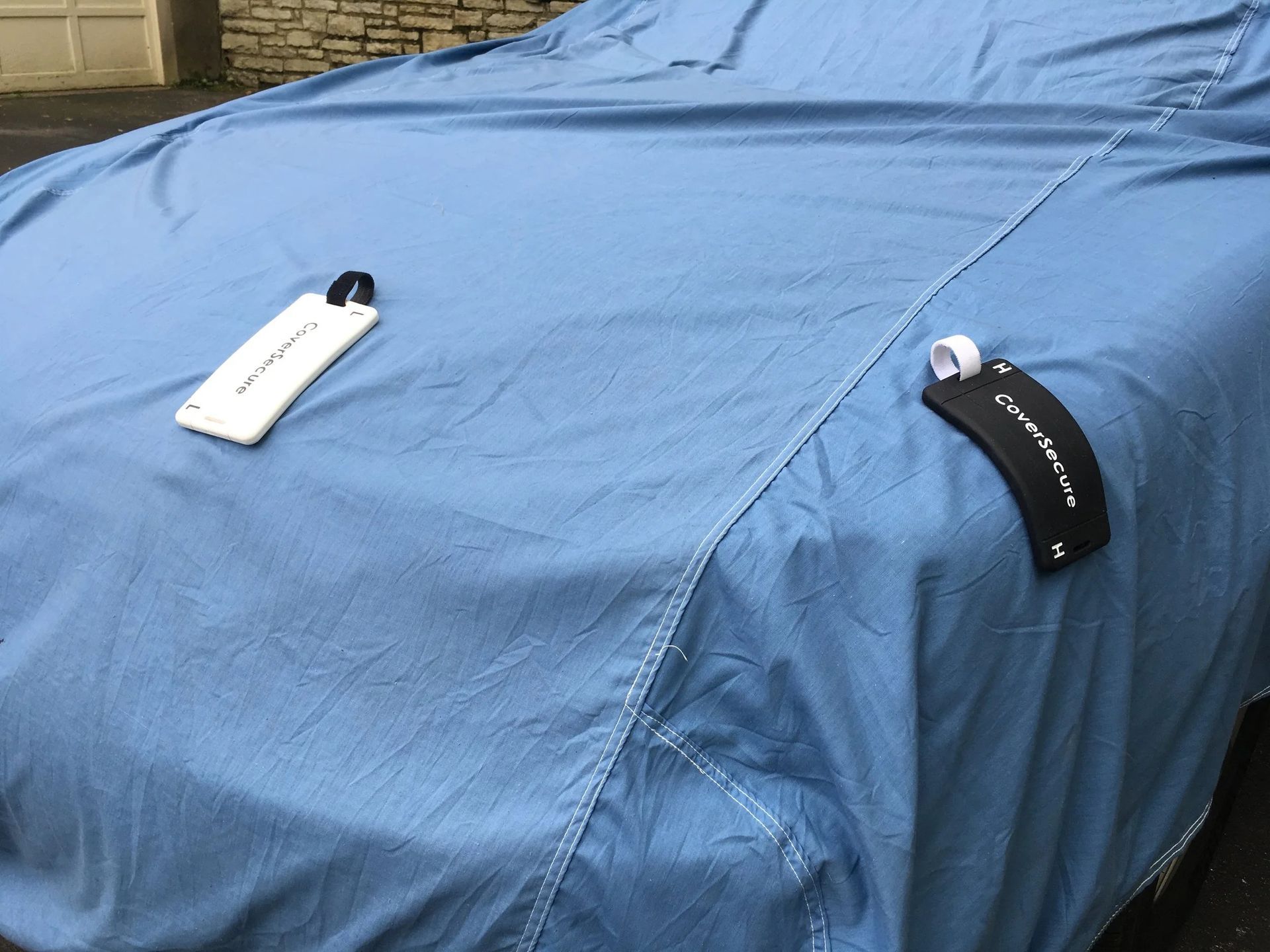 blue car cover with cover secure product in view