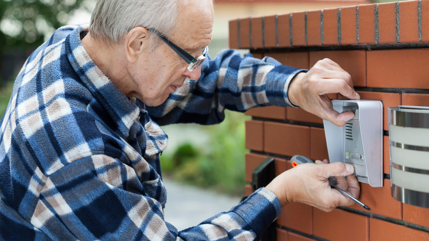 A person is using a smart card to open a door.