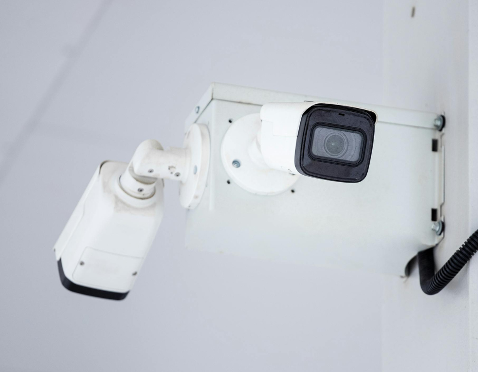 A person is using a smart card to open a door.