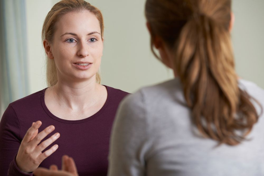 Young Woman Discussing Problems With Counselor - Rehabilitation in Brisbane, QLD