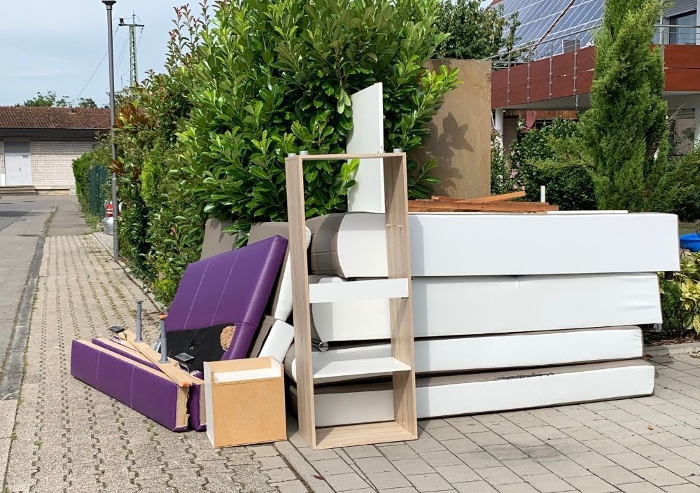 J&Z House Clearance Cardiff about to take a bulky Waste ready for collection from outside a house in Cardiff