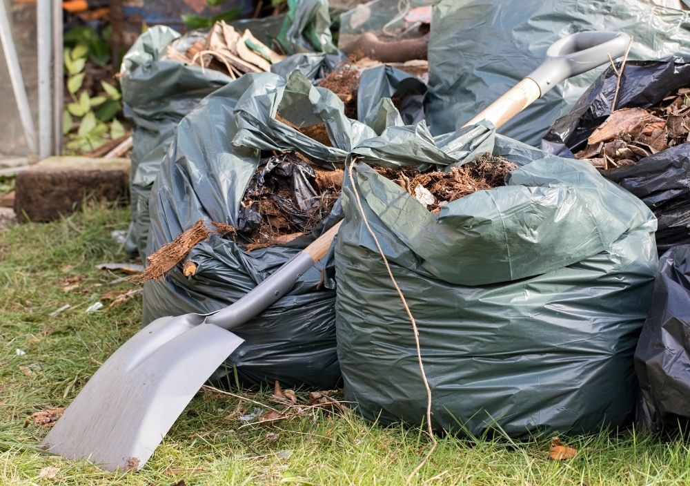 bagged up garden waste ready to be cleared away
