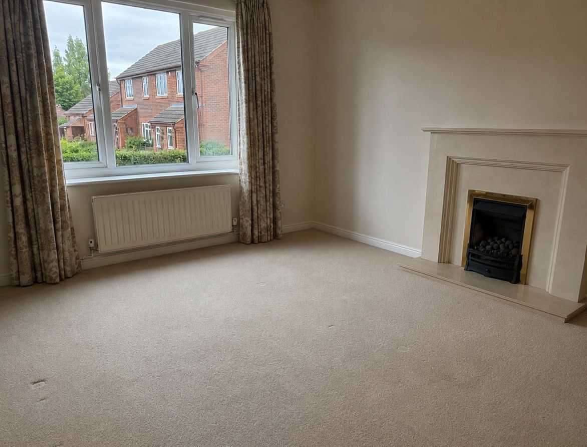 Living room cleared after bereavement house clearance in Cardiff
