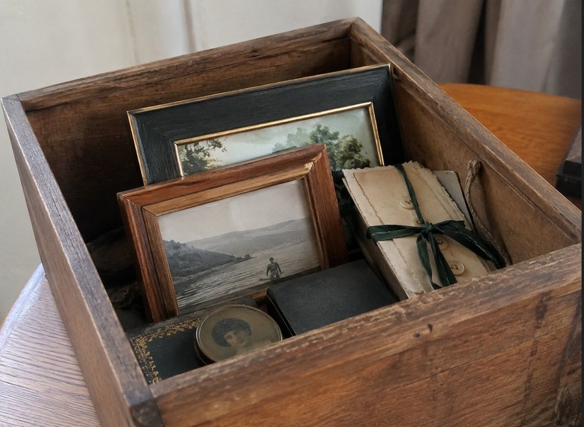 Keepsakes and photo frames set aside during a bereavement house clearance in Cardiff