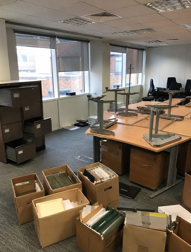 Office clearance in progress in Cardiff, furniture and files being cleared