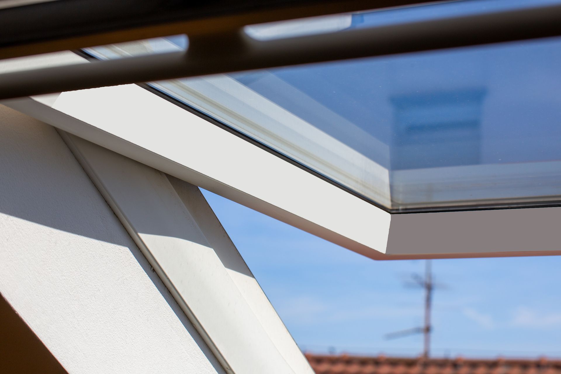 Interior view of a half-opened skylight Interior view of a half-opened skylight