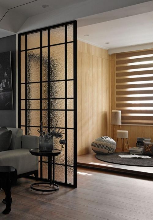 A living room with a couch and a table